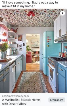 an open kitchen with blue cabinets and white appliances in the center is featured on instagram