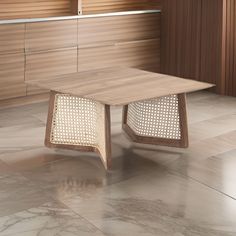 a wooden table sitting on top of a tiled floor