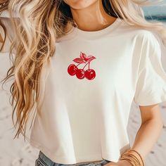 The Cutest Cherry Boxy Tee.  💠 This boxy tee is the perfect gift for a girly girlfriend in your life or a great addition to your wardrobe.  This women's oversized boxy t-shirt offers exceptional comfort and a relaxed style suitable for any occasion. Made from 100% ring-spun cotton, it feels incredibly soft. The boxy fit, with its slightly cropped, seamless design, provides that distinctive oversized look.  💠 Features 💠 :: Exceptionally Soft Ring-Spun Cotton :: Our tee style is UNISEX and runs Casual Cherry Print Crew Neck Top, Casual Crew Neck Top With Cherry Print, Casual White Cherry Print Tops, Cotton Crew Neck Top With Cherry Print, Relaxed Fit Cherry Print Top For Summer, White Short Sleeve Top With Cherry Print, Short Sleeve Tops As Summer Gift, White Cherry Print Short Sleeve Top, Summer Cherry Print Relaxed Fit Top