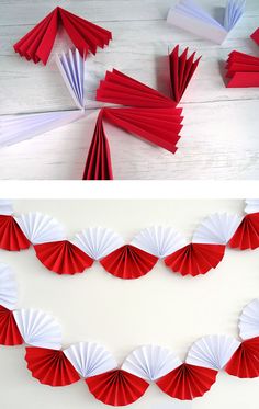 red and white paper fans are arranged on the wall to make an origami garland