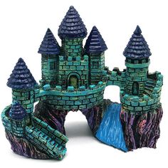 a toy castle made out of clay on a white background