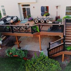 an aerial view of a deck and patio area