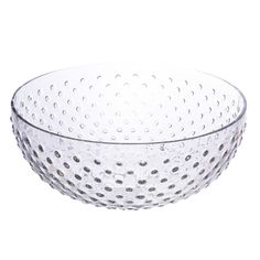 a glass bowl with holes on the side and bottom, sitting in front of a white background