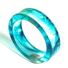 # 2021 This sea wave design raisin ring comes in size 7. Green Summer Rings, Sea Wave, Wave Ring, Sea Waves, Wave Design, Raisin, Rings Statement, Statement Rings, Jewelry Rings