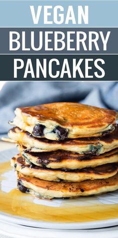 blueberry pancakes stacked on top of each other with text overlay that reads vegan blueberry pancakes