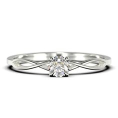 a white gold ring with a single diamond in the center and an intricate band around it