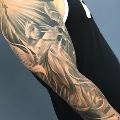 a man with a tattoo on his arm