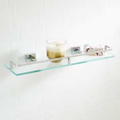 PRICES MAY VARY. Covered under Signature Hardware's 10 year limited Constructed of glass All hardware required for installation is included Mounting brackets are adjustable to desired width Tempered glass thickness 1/4" The Albury Collection Tempered Glass Shelf is both a contemporary accent and a functional storage space, and will be the perfect addition to any bathroom. Create a cohesive look in your bathroom with other Albury Collection pieces. Signature Hardware 916705 Features: Covered unde Glass Shower Shelves, Signature Hardware Bathroom, Glass Bathroom Shelves, Bathroom Furniture Storage, Floating Shelves Bathroom, Glass Theme, Tempered Glass Shelves, Chrome Bathroom, Shower Shelves