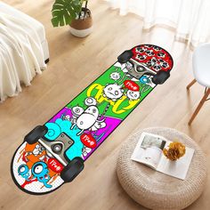 a skateboard with cartoon characters on it is sitting in the middle of a room