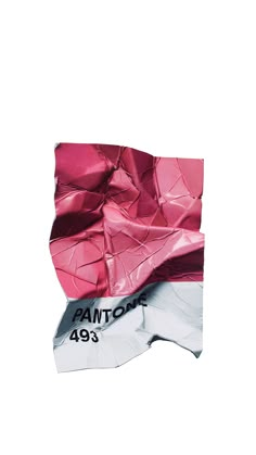 a piece of paper that has been wrapped in pink and silver foil with the word pantomr printed on it