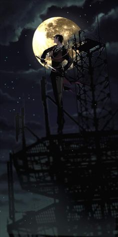 a man standing on top of a building under a full moon