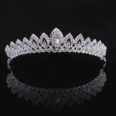 a tiara on a black background