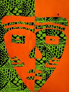 an orange and green painting with black dots on the bottom right corner is a man's face