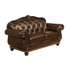 a brown leather love seat with nail polishing on the armrests and arms