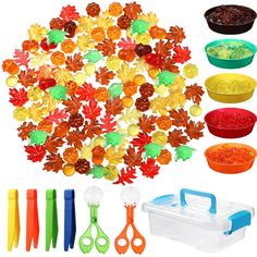 plastic fall leaves and scissors are shown in various colors, shapes, and sizes for play