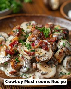 a wooden bowl filled with mushrooms covered in bacon