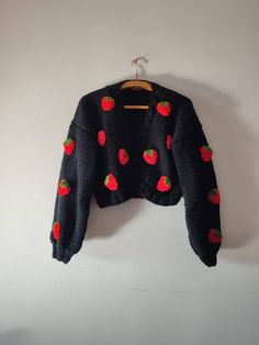 Black strawberry cardigan is mid cropped and hand knitted for fall/winter. İt is casual sweater,you can wash it in the machine sensitively. This chic vegan cardigan is knitted with cozy yarns ,no itchy.The embroideries are sewed on. İt will be your favorite casual piece! With or without buttons (3 red buttons) Measurement for M size Width 50-55 cm Length 48-50 cm I have all the intellectual property rights on the strawberry round shape cardigan. Strawberry Sweater Black, Strawberry Cardigan, Strawberry Sweater, Crochet Cardigan Tutorial, Aesthetic Motivation, Black Strawberry, Christmas Crochet Patterns Free, Embroidery Sweater, Property Rights