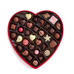 a heart shaped chocolate box filled with assorted chocolates