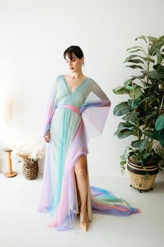 This listing is for an PRE order of the tulle Rainbow dress. Shown here with the beige slip dress under it (sold separately here: https://www.etsy.com/listing/745150347/boho-lace-dress-vintage-lace-dress-for?ref=listings_manager_grid)   Great for maternity photos of a rainbow baby or just rainbow loving people in general! Fits size 2-16, maternity and non maternity. Shoulder slits on both sides, open back, only comes in a small train due to the pattern.  If you choose to pay the deposit now, the remainder will be due when the dress is finished. I will email the email address on file. Deposit is NON REFUNDABLE and the dress will be forfeited if the remainder is not paid off within a week of when the invoice for the remainder is sent out. If you need more time I am happy to plan with you but Beige Slip Dress, Tulle Rainbow, Maximalist Wedding, Magical Dress, Birthday Sale, Loving People, Colorful Dress, Lace Dress Vintage, Flutter Dress