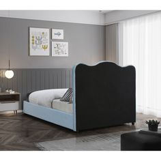 a bed that is in a room with gray walls