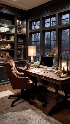 a home office with large windows and leather chairs