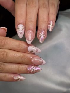 Cute pink almond christmas nails. Nail inspo. Pink nails. Short nails. Christmas Birthday Nails Almond, Coquette Christmas Nails Almond, Cute Almond Nails Design Christmas, Winter Nails Pink Rose Gold, Pink Floral Almond Nails, Almond Winter Nails Simple, Almond Simple Christmas Nails, Pink Gold Christmas Nails, Almond Xmas Nails Designs