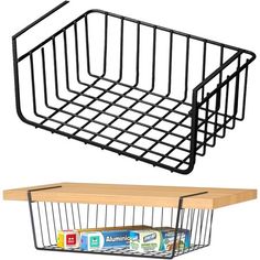 two wire baskets are hanging on the wall and one is holding an empty container with food