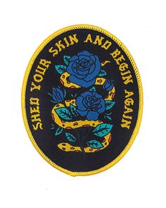 a black and yellow patch with blue roses on it that says keep your skin and bright again