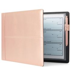 an ipad case with a pen on top of it and a checkbook in the back