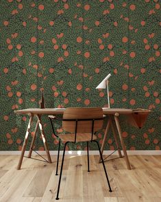 two wooden desks sitting on top of a hard wood floor