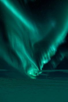 an aurora bore is seen in the night sky