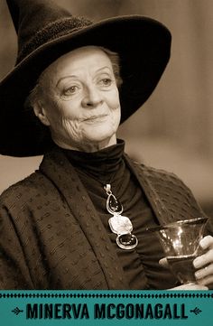 an older woman wearing a black hat and holding a glass in her hand with the words minnesota on it