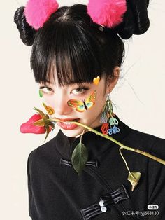 a woman with fake flowers on her face