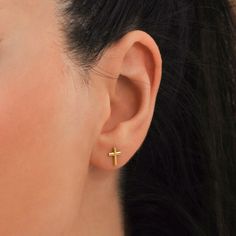 Gold Cross Stud Earrings embody the perfect mix of faith and style. With their carefully crafted delicate cross design, they radiate elegance and spirituality, making them a significant accessory for any occasion. PRODUCT DETAILS: Material: 14K Solid Gold Location: Earlobe Closure: Push Back Style: Minimalist Yellow Gold Cross Earrings For Pierced Ears, Elegant Cross Pendant Earrings, 14k Gold Cross Earrings, Elegant Hypoallergenic Cross-shaped Earrings, Elegant Hypoallergenic Cross Earrings, Street Style Necklace, Cross Earrings Studs, Mini Earrings, Zodiac Necklaces