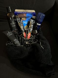 Mens hamper includes - Black box with lid 1 x Black bath towel 1 x Box Ouma Rusks 1 x Milk Chocolates 1 x Sukin facial wash for men - All skin types 1 x Sukin facial moisturiser for me - All skin types 2 x Sukin 3 in 1 wash for men - All skin types 1 x Gillette shaving cream  1 x Nose strip 1 x Coffee mug 1 x Dragon fly spoon 3 x Coffee sachets Coffee Sachets, X Box, Nose Strips, Black Bath, Dragon Fly, Shaving Cream, Facial Wash, Box With Lid, Black Box