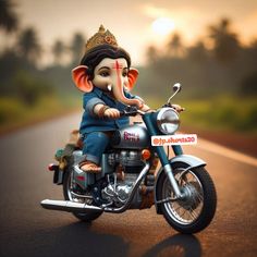 an elephant riding on the back of a motorcycle