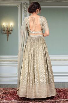 This Party Wear Lehenga D-345 features stunning gold embroidery, adding an elegant touch to any event. Expertly crafted, this traditional garment showcases intricate detailing and timeless style. Perfect for special occasions, this lehenga is sure to make a statement. Wedding Traditional Wear With Zari Work And Floor-length, Anarkali Style Sharara With Zari Work For Reception, Festive Sharara With Cutdana For Reception, Floor-length Cutdana Salwar Kameez For Reception, Festive Anarkali Traditional Wear For Reception, Gold Anarkali Set, Semi-stitched Sets With Gold Embroidery And Traditional Drape, Festive Cutdana Sharara For Reception, Transitional Art Silk Sharara For Reception