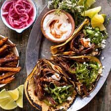 an assortment of mexican food on a plate