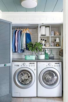 a washer and dryer in a small room