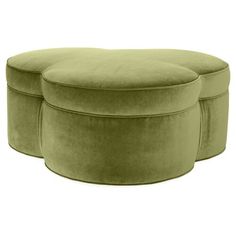 two green velvet stools sitting next to each other