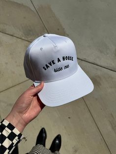 Ride into style with our Save a Horse Trucker Hat. Designed and embroidered in Charlotte NC, this white hat with black embroidery is perfect for country concerts, music festivals, or everyday wear. Giddy up and get yours now! Canvas Hat Has adjustable back OTTO Hat brand White Adjustable Trucker Dad Hat, White Hats For Spring Streetwear, White Hip Hop Baseball Cap For Summer, Summer White Trucker Hat With Embroidered Logo, White Trucker Hat With Embroidered Logo For Spring, White Embroidered Trucker Hat For Summer, White Embroidered Logo Trucker Hat For Summer, White Trucker Snapback Hat With Short Brim, Adjustable Snapback Hat With Embroidered Logo For Summer