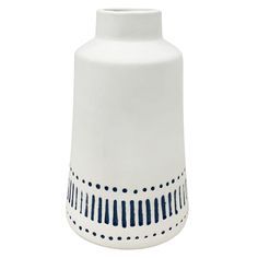 a white vase with blue stripes and dots on the bottom, sitting in front of a white background