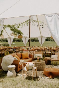 an outdoor seating area with chairs and tables