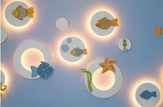 the wall is decorated with fish and sea creatures