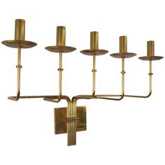 a brass chandelier with five lights on it