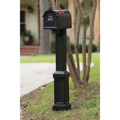 a black mailbox in front of a house