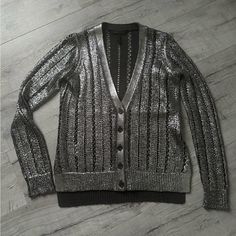 No Tags, But Never Worn Or Washed Chic Silver Tops For Winter, Elegant Silver Tops For Winter, Elegant Silver Winter Top, Women’s Silver Sweaters, Gray Knitted V-neck Outerwear, Gray Knit V-neck Outerwear, Metallic Shimmer V-neck Top, Chic Gray V-neck Cardigan, Sweaters & Cardigans