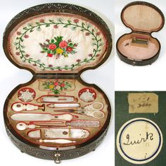 an antique sewing box with various tools in it