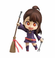 a figurine is holding a broom and wearing red eyes, while standing on a white background