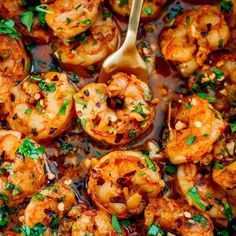 cooked shrimp with garlic and parsley in a skillet, ready to be eaten